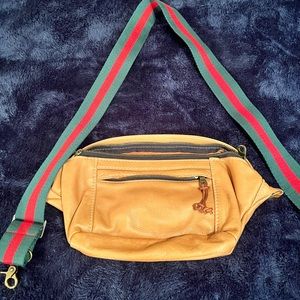Parker Thatch sling bag and crossbody green and red stripe strap
